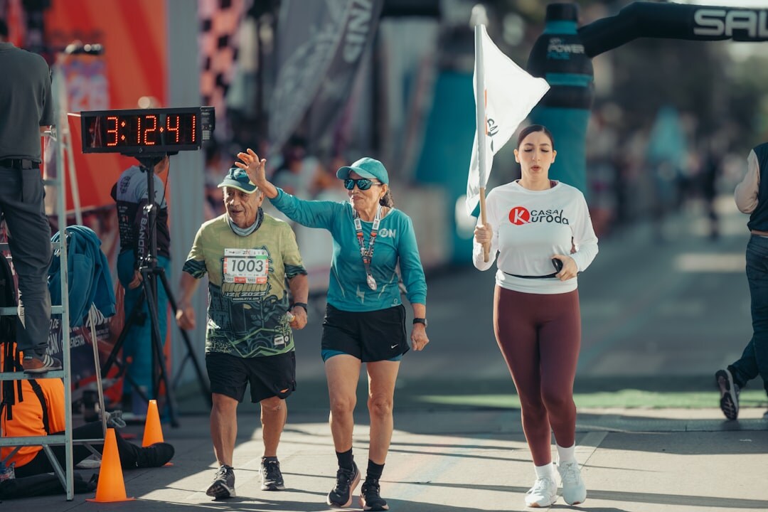 runner crossing finish line